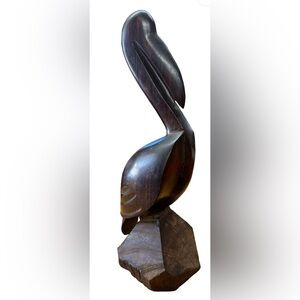 Iron wood pelican sculpture 10 inches tall